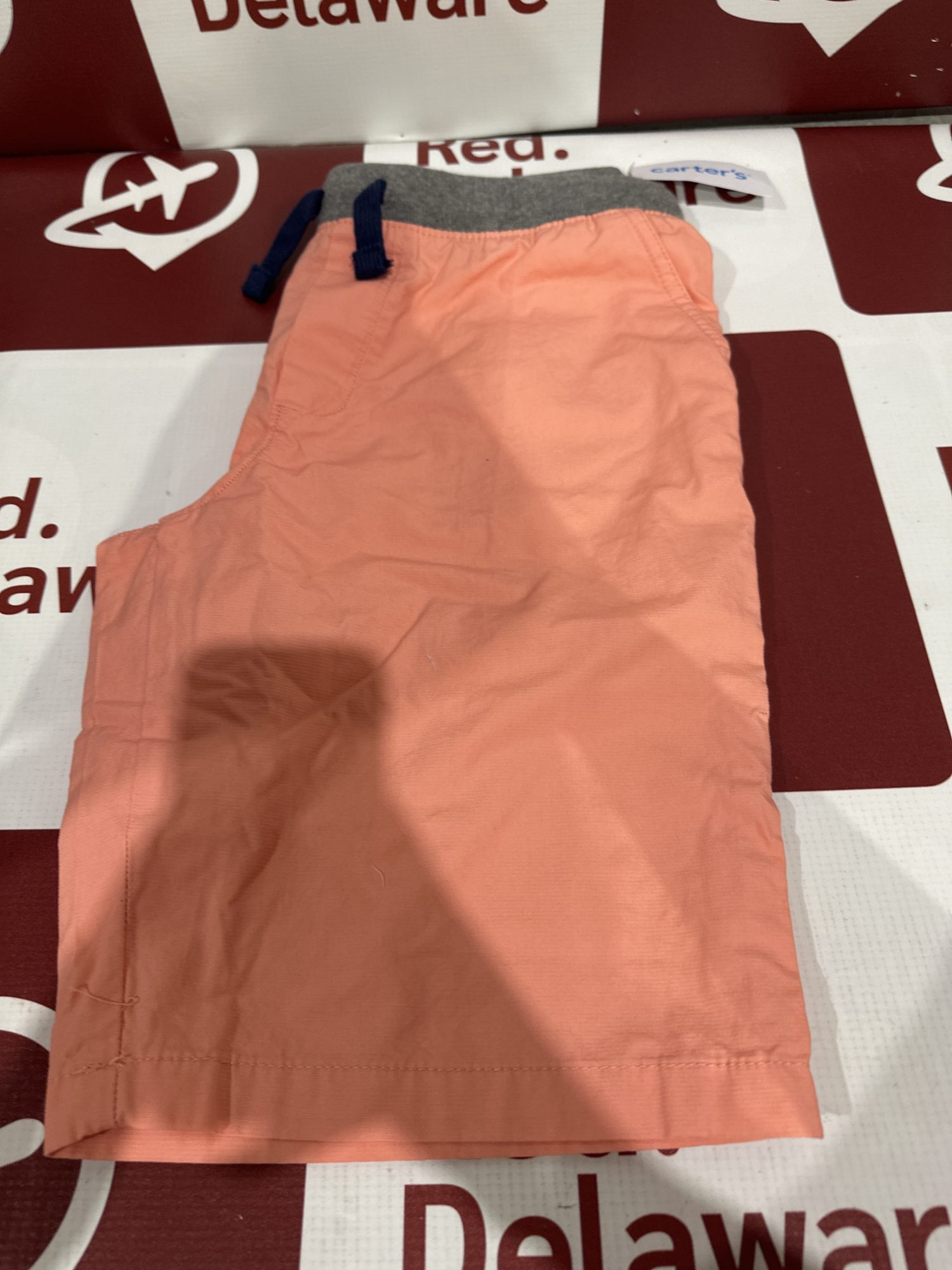 Carter’s Short laranja(E2)